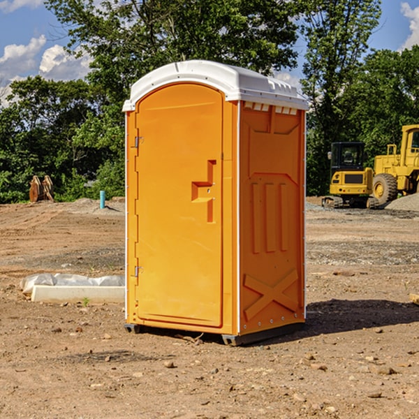 how often are the porta potties cleaned and serviced during a rental period in Bluff